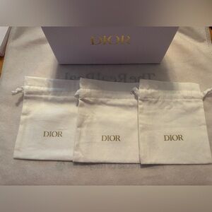Dior Gold Logo White Pouches